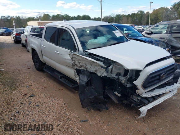 2023 Toyota Tacoma SR5 z VIN 3TYAZ5CN6PT039427, wystawiony jako IAAI lot #40866490 z przebiegiem 18 481 mil mil oraz . Historia ofert i sprzedaży dostępna na DreamBid. Obrazek 1.