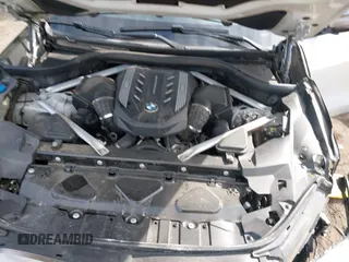 2020 BMW X5 M50i with VIN 5UXJU4C06LLE45651, listed as a IAAI auction lot 41618355 with 70,885 mi miles and . Bid and sale history available at DreamBid. Image 10.