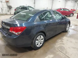 2015 Chevrolet Cruze LS with VIN 1G1PA5SG9F7222676, listed as a IAAI auction lot 41951033 with 102,375 mi miles. Bid and sale history available at carsss.com. Image 4.
