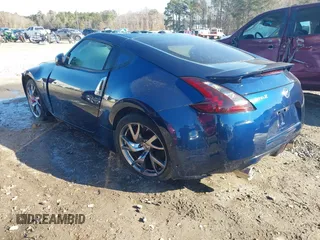 2014 Nissan 370Z Nismo with VIN JN1AZ4EH9EM635608, listed as a IAAI auction lot 41333034 with 45,354 mi miles and . Bid and sale history available at DreamBid. Image 3.