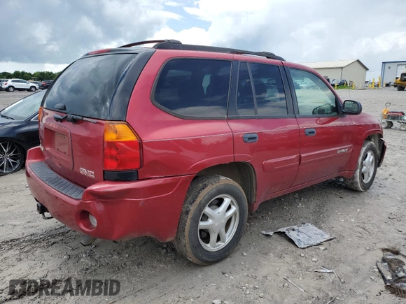 2005 GMC Envoy SLE z VIN 1GKDT13S752203494, wystawiony jako Copart lot #56150605 z przebiegiem 243 475 mil mil oraz Szkody całkowita. Historia ofert i sprzedaży dostępna na DreamBid. Obrazek 3.