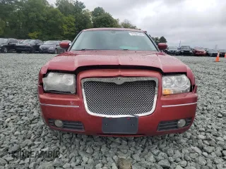 2009 Chrysler 300 Touring with VIN 2C3KA53V99H617274, listed as a Copart auction lot 71791144 with 123,045 mi miles and Salvage Title. Bid and sale history available at carsss.com. Image 5.