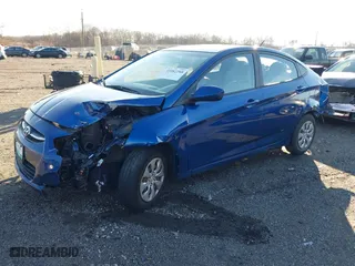2015 Hyundai Accent GLS with VIN KMHCT4AE6FU916149, listed as a IAAI auction lot 41082268 with 153,219 mi miles. Bid and sale history available at carsss.com. Image 17.