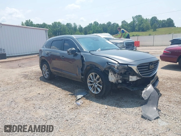 2018 Mazda CX-9 Grand Touring with VIN JM3TCADY7J0217595, listed as a IAAI auction lot 42381331 with 130,604 mi miles and . Bid and sale history available at DreamBid. Image 1.