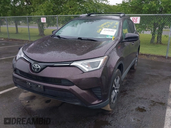 2018 Toyota RAV4 LE with VIN 2T3BFREV9JW857284, listed as a IAAI auction lot 42448480 with 85,551 mi miles and . Bid and sale history available at DreamBid. Image 2.