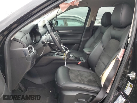 2020 Mazda CX-5 Touring with VIN JM3KFBCM1L0792706, listed as a Copart auction lot 73032144 with 56,845 mi miles and Salvage Title. Bid and sale history available at carsss.com. Image 7.