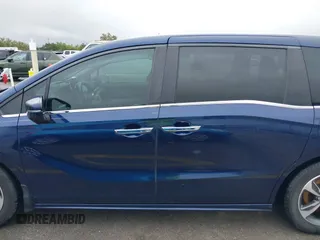 2018 Honda Odyssey Touring with VIN 5FNRL6H85JB001501, listed as a IAAI auction lot 41911497 with 92,407 mi miles. Bid and sale history available at carsss.com. Image 14.
