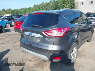 2016 Ford Escape Titanium with VIN 1FMCU9J99GUB27573, listed as a IAAI auction lot 42445457 with 156,784 mi miles and . Bid and sale history available at DreamBid. Image 17.