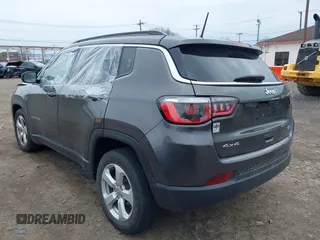 2018 Jeep Compass Latitude with VIN 3C4NJDBB8JT307154, listed as a IAAI auction lot 42056744 with 94,454 mi miles and . Bid and sale history available at DreamBid. Image 3.