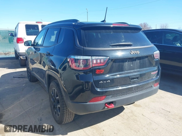 2019 Jeep Compass Trailhawk with VIN 3C4NJDDB1KT671642, listed as a IAAI auction lot 41810138 with 119,029 mi miles and . Bid and sale history available at carsss.com. Image 3.
