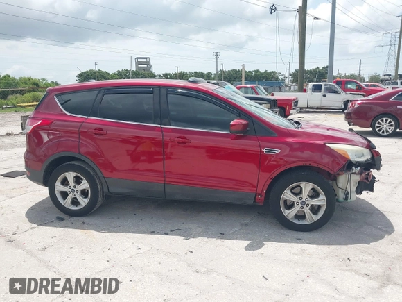 2014 Ford Escape SE with VIN 1FMCU9G92EUA15170, listed as a IAAI auction lot 42456495 with 158,123 mi miles and . Bid and sale history available at DreamBid. Image 14.