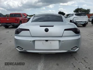 2012 Fisker Karma EcoChic z VIN YH4K16AAXCA000205, wystawiony jako Copart lot #73345464 z przebiegiem 103 346 mil mil oraz Tytuł czysty. Historia ofert i sprzedaży dostępna na DreamBid. Obrazek 6.
