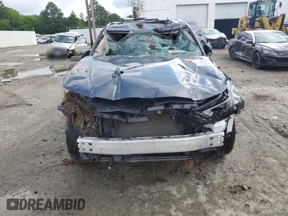 2024 Toyota Highlander XLE with VIN 5TDAAAB59RS001075, listed as a Copart auction lot 56958835 with 35,970 mi miles and Salvage title. Bid and sale history available at DreamBid. Image 5.