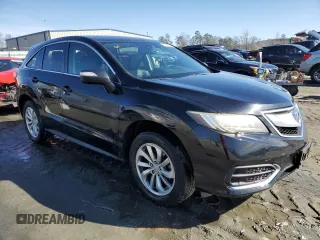 2016 Acura RDX Tech Pkg with VIN 5J8TB4H59GL023754, listed as a Copart auction lot 42636925 with 160,185 mi miles and Salvage Title. Bid and sale history available at carsss.com. Image 4.