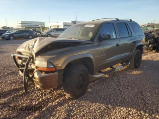 2000 Dodge Durango with VIN 1B4HS28Z1YF286930, listed as a Copart auction lot 85789974 with 188,311 mi miles and Salvage Title. Bid and sale history available at DreamBid. Image 1.