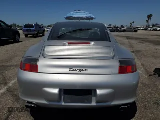 2003 Porsche 911 with VIN WP0BA29923S635457, listed as a Copart auction lot 61446545 with 85,602 mi miles and Salvage title. Bid and sale history available at DreamBid. Image 6.