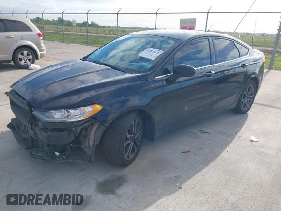 2017 Ford Fusion S with VIN 3FA6P0G75HR353909, listed as a IAAI auction lot 42024272 with 151,383 mi miles. Bid and sale history available at carsss.com. Image 2.