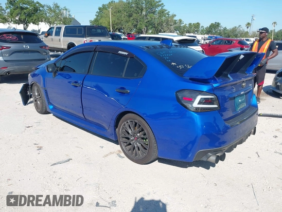 2016 Subaru WRX with VIN JF1VA1B62G9823616, listed as a IAAI auction lot 42028560 with 90,543 mi miles. Bid and sale history available at carsss.com. Image 3.