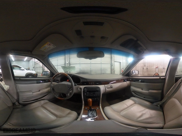 2004 Cadillac Seville Luxury SLS with VIN 1G6KS54Y74U163861, listed as a IAAI auction lot 41881291 with 215,518 mi miles. Bid and sale history available at carsss.com. Image 19.
