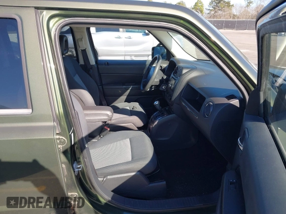 2009 Jeep Patriot Sport with VIN 1J4FT28B99D139661, listed as a IAAI auction lot 41644514 with 155,117 mi miles and . Bid and sale history available at DreamBid. Image 5.