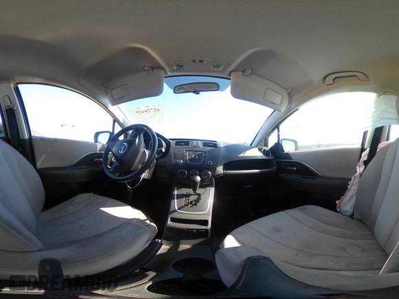 2014 Mazda 5 Sport with VIN JM1CW2BL9E0168662, listed as a IAAI auction lot 42726429 with 145,190 mi miles and . Bid and sale history available at DreamBid. Image 18.