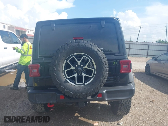 2024 Jeep Wrangler Rubicon with VIN 1C4PJXFG0RW271322, listed as a IAAI auction lot 42736647 with 32,319 mi miles and . Bid and sale history available at DreamBid. Image 16.