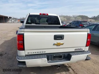 2015 Chevrolet Silverado 1500 High Country with VIN 3GCUKTEC7FG205805, listed as a IAAI auction lot 41815859 with 130,028 mi miles. Bid and sale history available at carsss.com. Image 16.