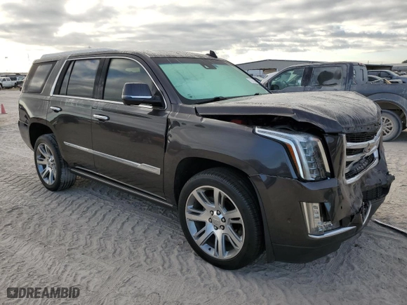2015 Cadillac Escalade Premium with VIN 1GYS3NKJ2FR722538, listed as a Copart auction lot 77674394 with 130,718 mi miles and Salvage Title. Bid and sale history available at carsss.com. Image 4.