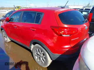 2015 Kia Sportage LX with VIN KNDPBCAC6F7701564, listed as a IAAI auction lot 41872684 with 162,945 mi miles and . Bid and sale history available at DreamBid. Image 3.