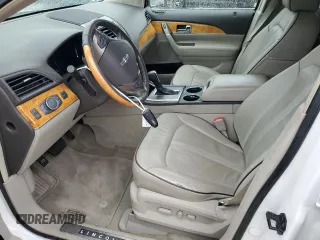 2015 Lincoln MKX z VIN 2LMDJ6JK7FBL23356, wystawiony jako Copart lot #56653295 z przebiegiem 101 982 mil mil oraz Szkoda całkowita • Salvage title. Historia ofert i sprzedaży dostępna na DreamBid. Obrazek 7.