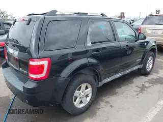 2008 Ford Escape Hybrid with VIN 1FMCU49H38KE50450, listed as a IAAI auction lot 42565336 with Not provided miles and . Bid and sale history available at DreamBid. Image 4.