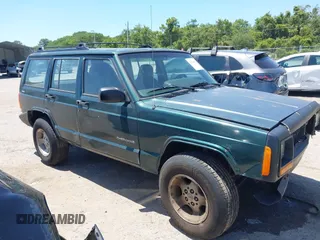 2000 Jeep Cherokee SE with VIN 1J4FF28S0YL236369, listed as a IAAI auction lot 42314386 with 159,005 mi miles and . Bid and sale history available at DreamBid. Image 13.