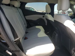2022 Ford Mustang Mach-E Premium z VIN 3FMTK3R7XNMA24055, wystawiony jako Copart lot #62717525 z przebiegiem 25 079 mil mil oraz Szkoda całkowita • Salvage title. Historia ofert i sprzedaży dostępna na DreamBid. Obrazek 11.