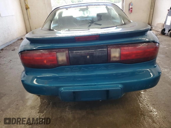 1995 Pontiac Firebird Firebird with VIN 2G2FS22S7S2240523, listed as a Copart auction lot 57970545 with 119,682 mi miles and Salvage title. Bid and sale history available at DreamBid. Image 6.