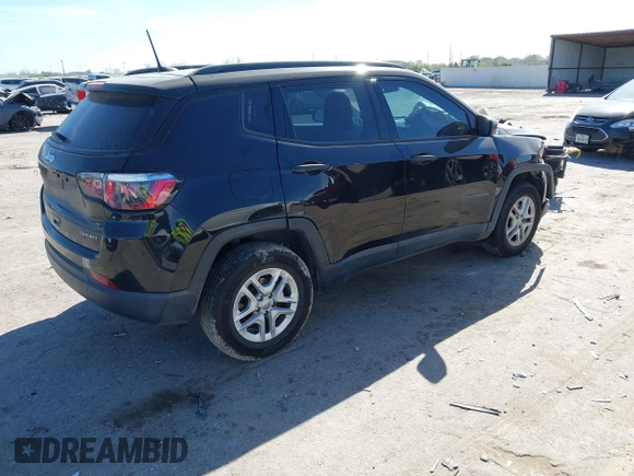 2018 Jeep Compass Sport with VIN 3C4NJCABXJT214907, listed as a IAAI auction lot 41814215 with 96,111 mi miles and . Bid and sale history available at DreamBid. Image 4.
