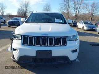 2019 Jeep Grand Cherokee Laredo E with VIN 1C4RJFAG7KC694674, listed as a IAAI auction lot 41591678 with 61,144 mi miles. Bid and sale history available at carsss.com. Image 12.