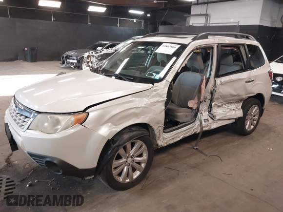 2012 Subaru Forester X Premium with VIN JF2SHADC8CH429115, listed as a IAAI auction lot 41863506 with 114,368 mi miles and . Bid and sale history available at DreamBid. Image 2.