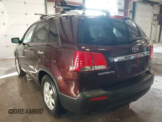 2013 Kia Sorento LX with VIN 5XYKT4A27DG315059, listed as a IAAI auction lot 41571574 with 217,527 mi miles. Bid and sale history available at carsss.com. Image 3.