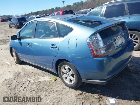 2007 Toyota Prius with VIN JTDKB20U177603087, listed as a IAAI auction lot 41828228 with 174,534 mi miles. Bid and sale history available at carsss.com. Image 3.