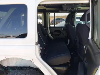 2023 Jeep Wrangler Rubicon with VIN 1C4JJXR63PW580370, listed as a IAAI auction lot 42017282 with 31,823 mi miles and . Bid and sale history available at DreamBid. Image 8.