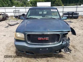 1999 GMC Denali z VIN 1GKEK13R5XR906686, wystawiony jako Copart lot #64451994 z przebiegiem 273 180 mil mil oraz Szkody całkowita. Historia ofert i sprzedaży dostępna na DreamBid. Obrazek 5.