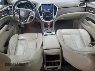 2013 Cadillac SRX Performance Collection z VIN 3GYFNHE33DS602428, wystawiony jako Copart lot #55688555 z przebiegiem 143 504 mil mil oraz Szkody całkowita. Historia ofert i sprzedaży dostępna na DreamBid. Obrazek 8.