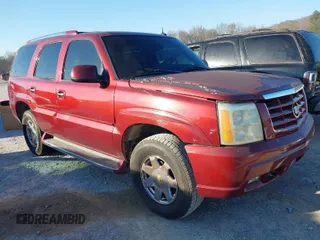 2003 Cadillac Escalade z VIN 1GYEC63T63R132602, wystawiony jako IAAI lot #41778576 z przebiegiem 242 443 mil mil oraz . Historia ofert i sprzedaży dostępna na DreamBid. Obrazek 1.