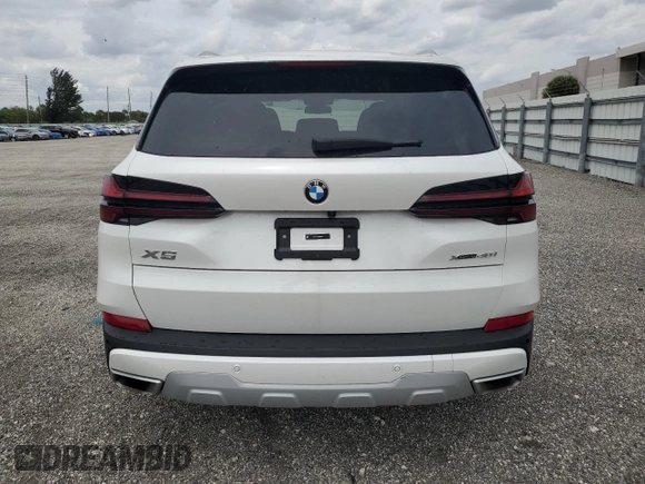 2024 BMW X5 xDrive40i z VIN 5UX23EU04R9T59544, wystawiony jako Copart lot #48216655 z przebiegiem 23 706 mil mil oraz Tytuł czysty. Historia ofert i sprzedaży dostępna na DreamBid. Obrazek 6.