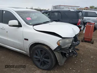 2013 Dodge Durango R/T z VIN 1C4SDJCT5DC685111, wystawiony jako IAAI lot #40761805 z przebiegiem 202 888 mil mil oraz . Historia ofert i sprzedaży dostępna na DreamBid. Obrazek 1.