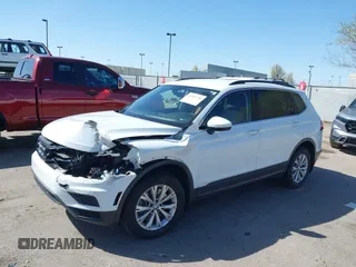 2019 Volkswagen Tiguan SE with VIN 3VV2B7AX8KM193166, listed as a IAAI auction lot 41957720 with 61,981 mi miles and . Bid and sale history available at DreamBid. Image 2.