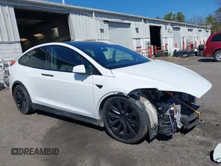 2022 Tesla Model X with VIN 7SAXCDE58NF342776, listed as a IAAI auction lot 42042369 with 70,301 mi miles and . Bid and sale history available at carsss.com. Image 1.