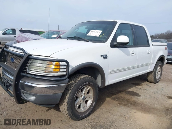 2003 Ford F-150 XLT with VIN 1FTRW08L73KA73945, listed as a IAAI auction lot 41474904 with 122,080 mi miles. Bid and sale history available at carsss.com. Image 2.