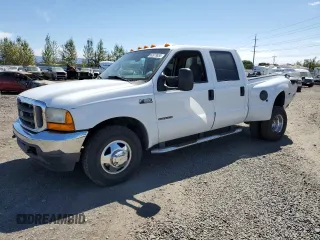 2001 Ford F-350 XL with VIN 1FTWW32F01ED08768, listed as a Copart auction lot 62873634 with 317,184 mi miles and Salvage title. Bid and sale history available at DreamBid. Image 1.