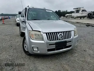 2010 Mercury Mariner with VIN 4M2CN8B7XAKJ30875, listed as a Copart auction lot 59964305 with 117,799 mi miles and Salvage title. Bid and sale history available at DreamBid. Image 14.